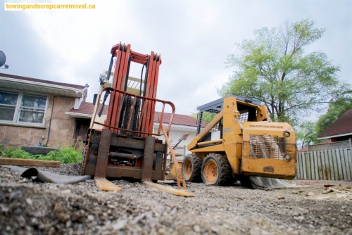 Bobcat and a Forklift 